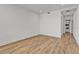 Bright bedroom features wood flooring, recessed lighting, and neutral walls at 455 Pinellas Bayway S # 3B, Tierra Verde, FL 33715