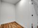Empty bedroom with vinyl plank flooring and base-trim at 455 Pinellas Bayway S # 3B, Tierra Verde, FL 33715
