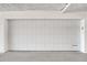 White garage door for two car parking at 455 Pinellas Bayway S # 3B, Tierra Verde, FL 33715