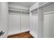 Walk-in closet with shelving and wooden floor at 455 Pinellas Bayway S # 3B, Tierra Verde, FL 33715