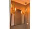 Elegant bathroom features a decorative mirror and unique pendant lighting with glass shades at 4716 W Lawn Ave, Tampa, FL 33611
