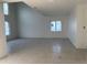Spacious living room with tall ceilings, awaiting your personal touches and decor at 4716 W Lawn Ave, Tampa, FL 33611