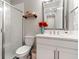 Modern bathroom featuring white cabinets, a glass enclosed shower, and neutral paint at 4784 San Martino Dr, Wesley Chapel, FL 33543