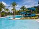 Fun community pool includes a winding blue waterslide and a dedicated lap-swimming area at 4784 San Martino Dr, Wesley Chapel, FL 33543
