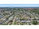 Charming neighborhood with well-kept lawns and mature trees viewed from above on a sunny day at 5053 43Rd S St, St Petersburg, FL 33711