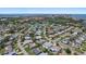Beautiful aerial view of the neighborhood with lush landscaping and well-maintained homes on an ideal sunny day at 5053 43Rd S St, St Petersburg, FL 33711