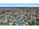 Wide aerial view of the neighborhood, showcasing the single-Gathering homes and proximity to the ocean at 5053 43Rd S St, St Petersburg, FL 33711
