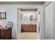 Traditional bathroom with double sinks, ample storage and an enclosed toilet area at 5053 43Rd S St, St Petersburg, FL 33711