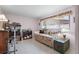 Cozy bedroom with a daybed, desk, and bright window offering natural light at 5053 43Rd S St, St Petersburg, FL 33711