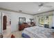 Bedroom with an outdoor view, and traditional furnishings including a dresser and mirror at 5053 43Rd S St, St Petersburg, FL 33711