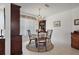 Cozy dining area with a round table, chairs, and classic chandelier creating a welcoming atmosphere at 5053 43Rd S St, St Petersburg, FL 33711