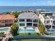 Aerial view of luxury home with a swimming pool, a waterfront, and a scenic landscape at 5142 W San Jose St, Tampa, FL 33629
