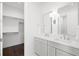 Bathroom featuring double sinks, ample counter space, and modern fixtures at 5142 W San Jose St, Tampa, FL 33629