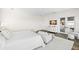 Bright main bedroom showcasing neutral décor and a private balcony at 5142 W San Jose St, Tampa, FL 33629