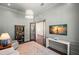 Cozy office featuring wainscoting, neutral paint, an area rug, and a stylish light fixture at 5142 W San Jose St, Tampa, FL 33629
