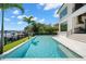 Luxury pool with waterfront views, with a lush yard, and a spacious patio at 5142 W San Jose St, Tampa, FL 33629