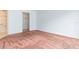 Bedroom featuring carpet and entry to the bathroom and closet at 5421 Orange Blossom N Rd, Pinellas Park, FL 33782