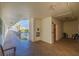 Well lit hallway with neutral flooring leading to a room with a waterfront view at 5575 Gulf Blvd # 329, St Pete Beach, FL 33706