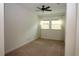 Bright bedroom with carpet and a ceiling fan, offering a cozy atmosphere at 6417 Blue Sail Ln, Apollo Beach, FL 33572