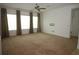 Spacious bedroom features plush carpeting, natural light, and ample space for relaxation and personalization at 6417 Blue Sail Ln, Apollo Beach, FL 33572