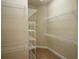 Walk-in closet with wire shelving for organized storage solutions at 6417 Blue Sail Ln, Apollo Beach, FL 33572