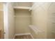 Well-organized walk-in closet with ample shelving for storage at 6417 Blue Sail Ln, Apollo Beach, FL 33572