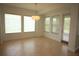 Bright dining room featuring tile floors, recessed lighting, and large windows for natural light at 6417 Blue Sail Ln, Apollo Beach, FL 33572