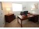 Office space featuring a large desk, ample lighting, and neutral walls at 6417 Blue Sail Ln, Apollo Beach, FL 33572