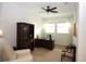Bright home office with a large desk, elegant hutch, and comfortable seating at 6417 Blue Sail Ln, Apollo Beach, FL 33572
