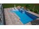 An artistic rendering showcases a luxurious pool with a spa, sun loungers, and modern design at 716 Manns Harbor Dr, Apollo Beach, FL 33572