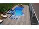 A rendering shows a custom pool design with a spa, sun loungers, and lush tropical landscaping at 716 Manns Harbor Dr, Apollo Beach, FL 33572