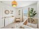 Bright Bedroom featuring modern decor, neutral tones, and soft carpeting at 7207 Forest Mere Dr, Riverview, FL 33578
