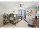 Bright ' room includes bunk beds with a slide and open shelving for storage at 7207 Forest Mere Dr, Riverview, FL 33578
