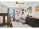Spacious ' bedroom with bunk beds, a comfy sofa, and playful decor at 7207 Forest Mere Dr, Riverview, FL 33578