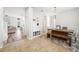 Open foyer with tile flooring, storage, and a view of the living and dining areas at 7207 Forest Mere Dr, Riverview, FL 33578