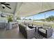 Inviting screened-in patio with outdoor seating, perfect for entertaining and relaxation at 7207 Forest Mere Dr, Riverview, FL 33578
