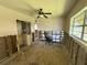 The room offers a combination of natural light and a fan, with potential for customization and improvement at 7365 Royal Palm Dr, New Port Richey, FL 34652