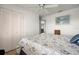 Comfortable bedroom features a ceiling fan and ample closet space at 8141 Aquila St # 342, Port Richey, FL 34668