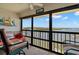 Relaxing lanai with seating and a beautiful view of the water and surrounding islands at 8141 Aquila St # 342, Port Richey, FL 34668