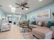 Living area view with comfortable seating, open to dining, and a screened lanai, perfect for relaxation at 8141 Aquila St # 342, Port Richey, FL 34668