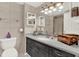 Bathroom with large vanity and ample lighting at 880 Mandalay Ave # N710, Clearwater Beach, FL 33767