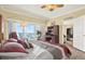 Bright bedroom with desk, beach view, and balcony access at 880 Mandalay Ave # N710, Clearwater Beach, FL 33767