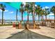 Community grilling area with ocean views and seating at 880 Mandalay Ave # N710, Clearwater Beach, FL 33767