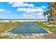 Outdoor shuffleboard court with ocean backdrop for leisurely games at 880 Mandalay Ave # N710, Clearwater Beach, FL 33767
