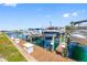 View of a boat dock area with boat lifts for easy storage, showcasing waterfront lifestyle at 0 Beach Se Dr # 162Ss, St Petersburg, FL 33705