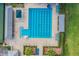 Aerial shot of the community pool, featuring landscaping and lounge chairs at 10510 Castleford Way, Tampa, FL 33626