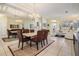 Open-concept living space with dining area, living room, and seamless flow throughout at 10510 Castleford Way, Tampa, FL 33626