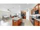 Spacious kitchen with island, granite countertops, stainless steel appliances, and ample cabinet space at 11208 Leland Groves Dr, Riverview, FL 33579