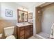 Bathroom featuring a single sink vanity and tiled walk-in shower at 11383 Pickford St, Spring Hill, FL 34609
