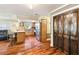 Bright kitchen features stainless steel appliances, wood cabinets, and center island at 11383 Pickford St, Spring Hill, FL 34609